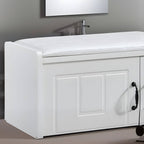 Compact white ottoman in a luxurious bedroom