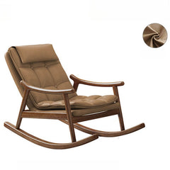 Brown wood rocking chair couch in serene setting