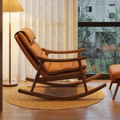 Brown wood rocking chair couch in serene setting