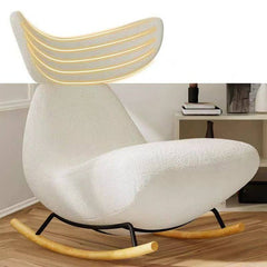 Modern Wingback Rocking Chair in Indoor Setting