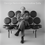 George Nelson sitting on the Marshmallow Sofa he designed