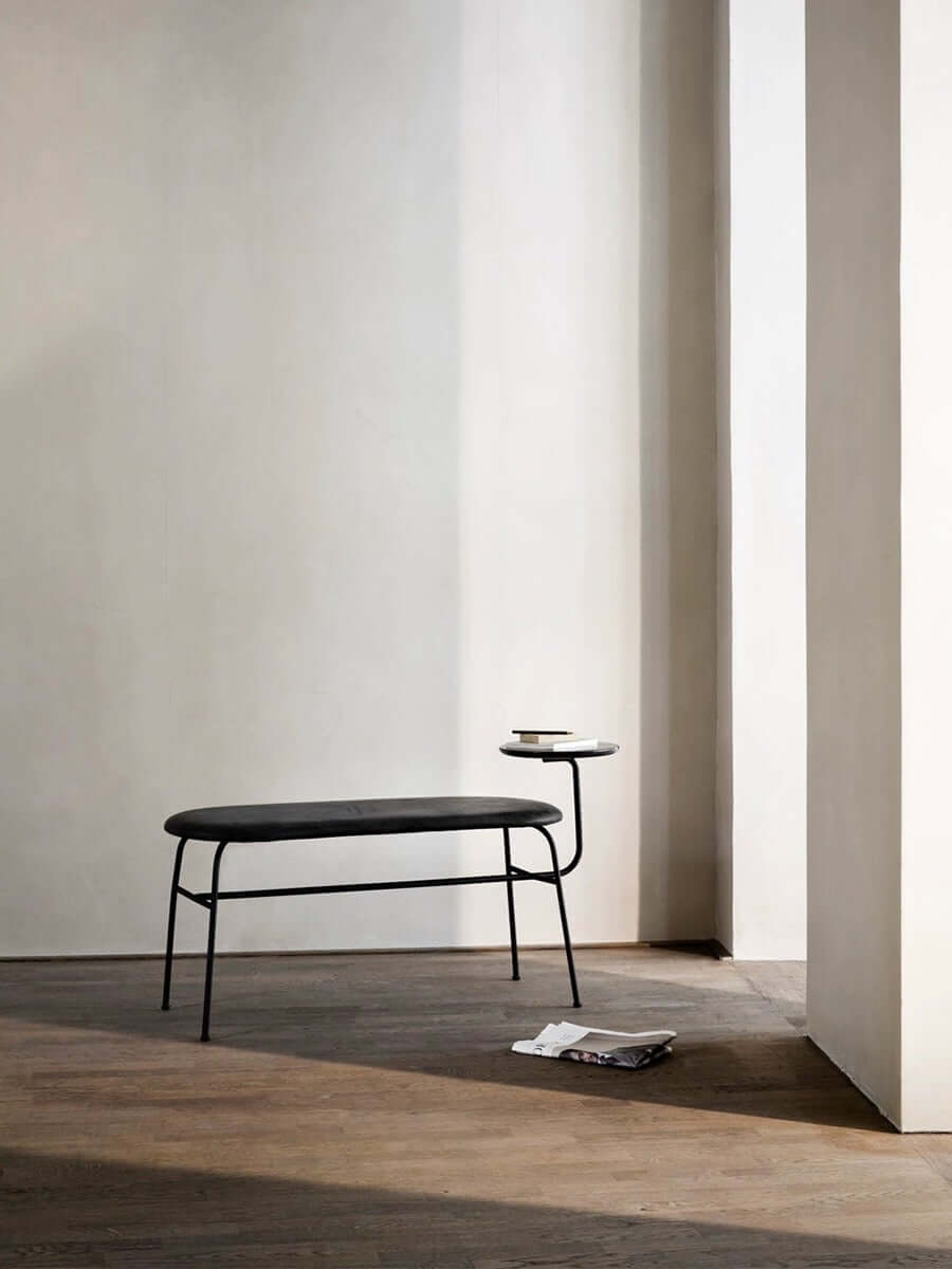 Comfortable upholstered oval bench with side table in luscious brown