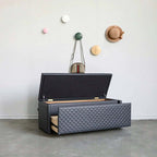 Stylish liftable bench upholstered in orange vegan leather with concealed storage ottoman