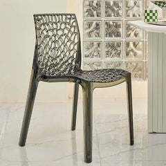 Modern and elegant Northcutt stacking side chair in clear acrylic