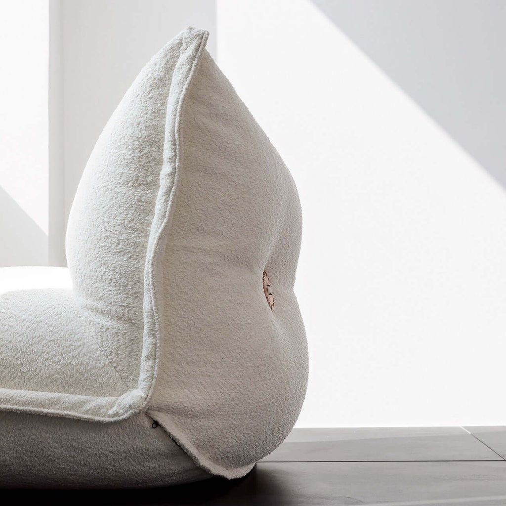 White alpaca boucle caterpillar single sofa lounge chair with floor-standing design