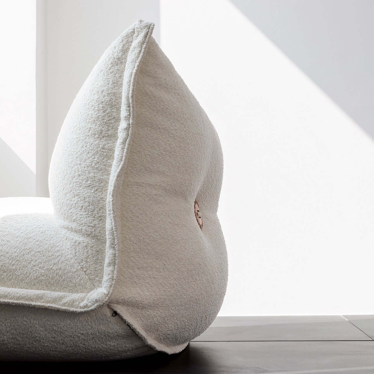 White alpaca boucle caterpillar single sofa lounge chair with floor-standing design