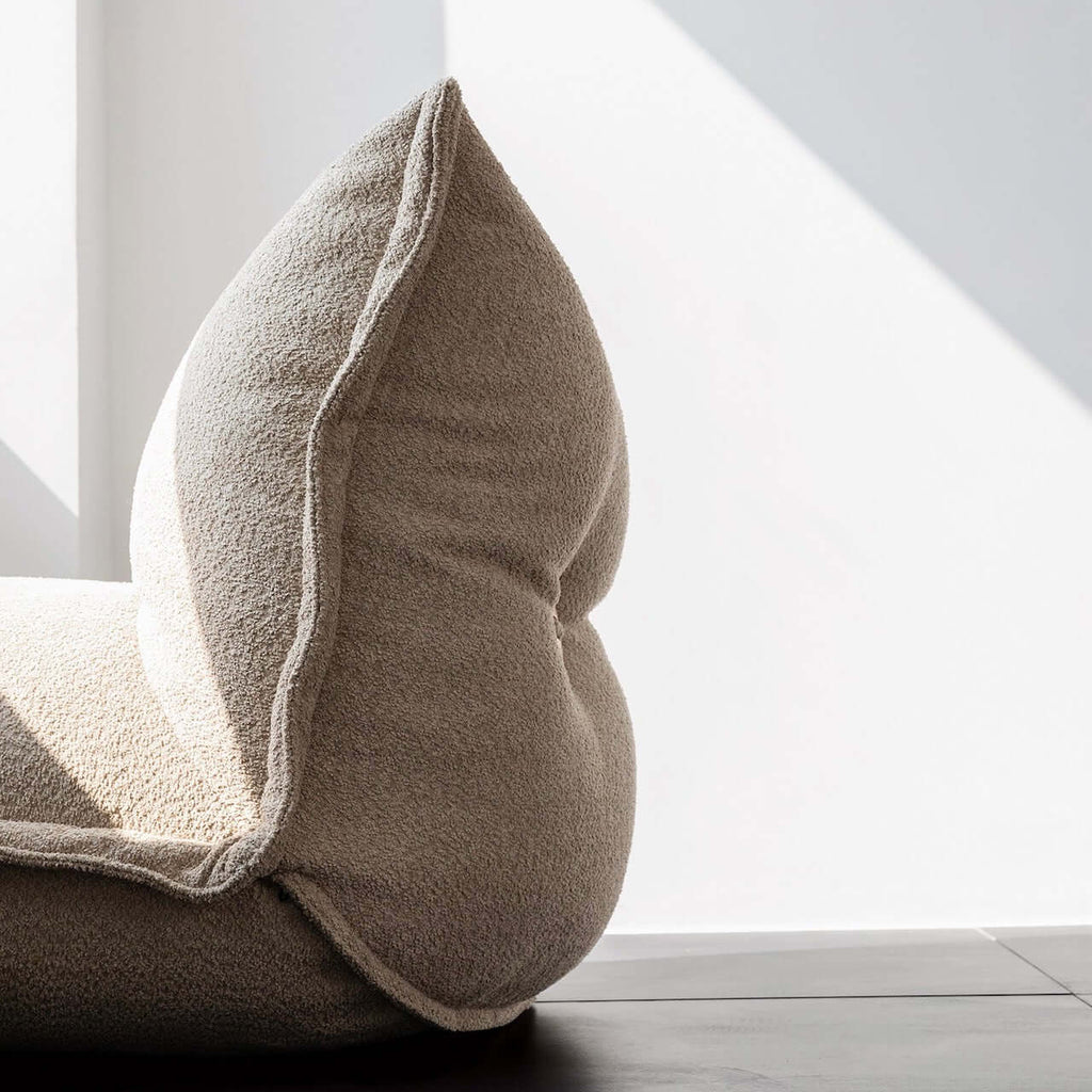 White alpaca boucle caterpillar single sofa lounge chair with floor-standing design