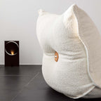 White alpaca boucle caterpillar single sofa lounge chair with floor-standing design