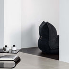 White alpaca boucle caterpillar single sofa lounge chair with floor-standing design