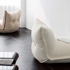 White alpaca boucle caterpillar single sofa lounge chair with floor-standing design