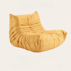 Child's Yellow Suede Furry Caterpillar Lounge Chair in Bedroom Setting