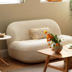 2 seater Nordic white boucle sofa with sherpa upholstery, perfect for a cozy living room