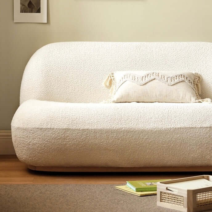 2 seater Nordic white boucle sofa with sherpa upholstery, perfect for a cozy living room