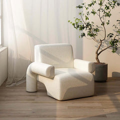 Soft and cozy sherpa upholstery accent chair with curved base and ottoman