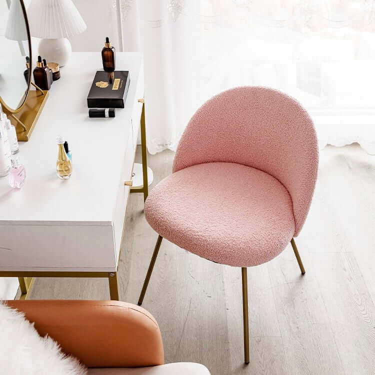 White Nordic vanity stool with elegant gold-tone metal legs for stylish seating