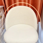 White Nordic vanity stool with elegant gold-tone metal legs for stylish seating
