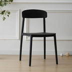Scandinavian style low back kitchen and dining chair made of plastic and acrylic