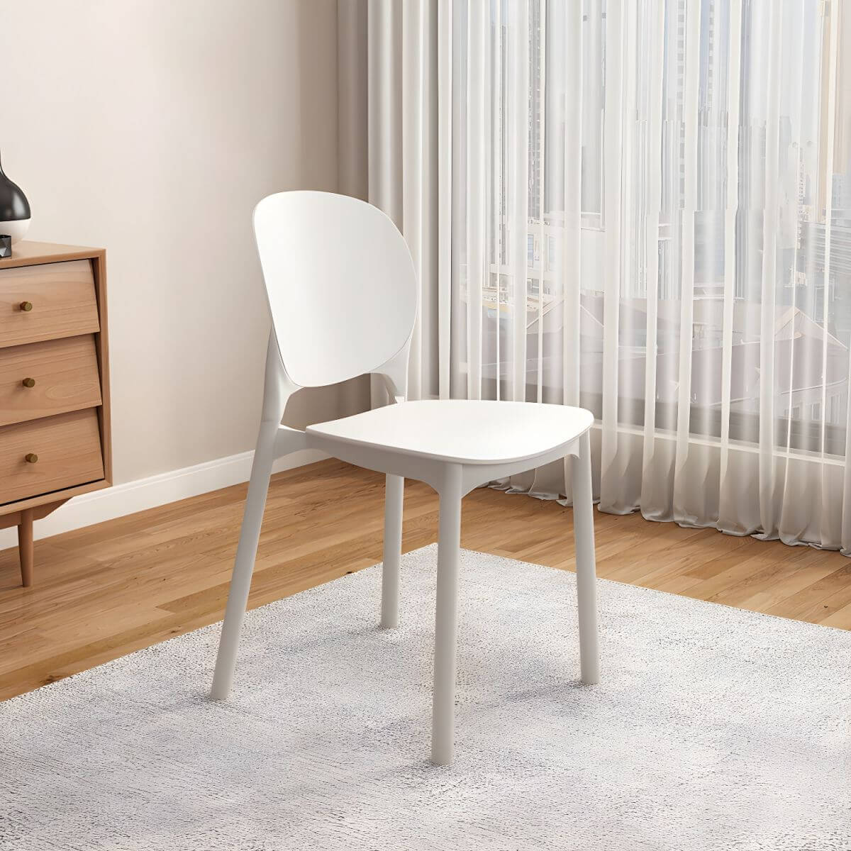 Stackable Scandinavian side chair with open back made of plastic and acrylic for dining