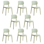 Stackable Scandinavian style plastic and acrylic side chair with low back for dining