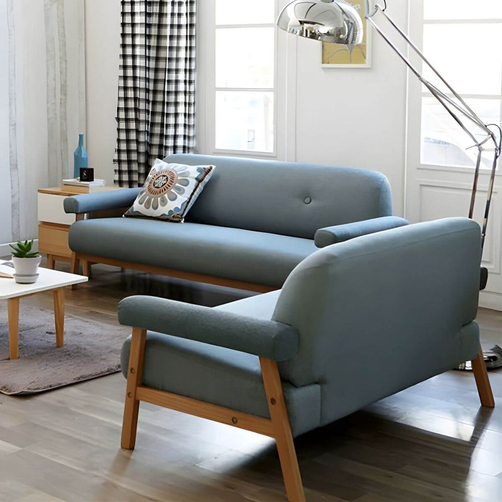 Black Scandinavian style small sofa with wood frame and faux leather upholstery