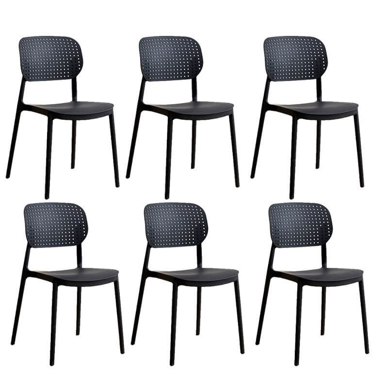 Stackable Scandinavian style plastic and acrylic side chair with low back for dining