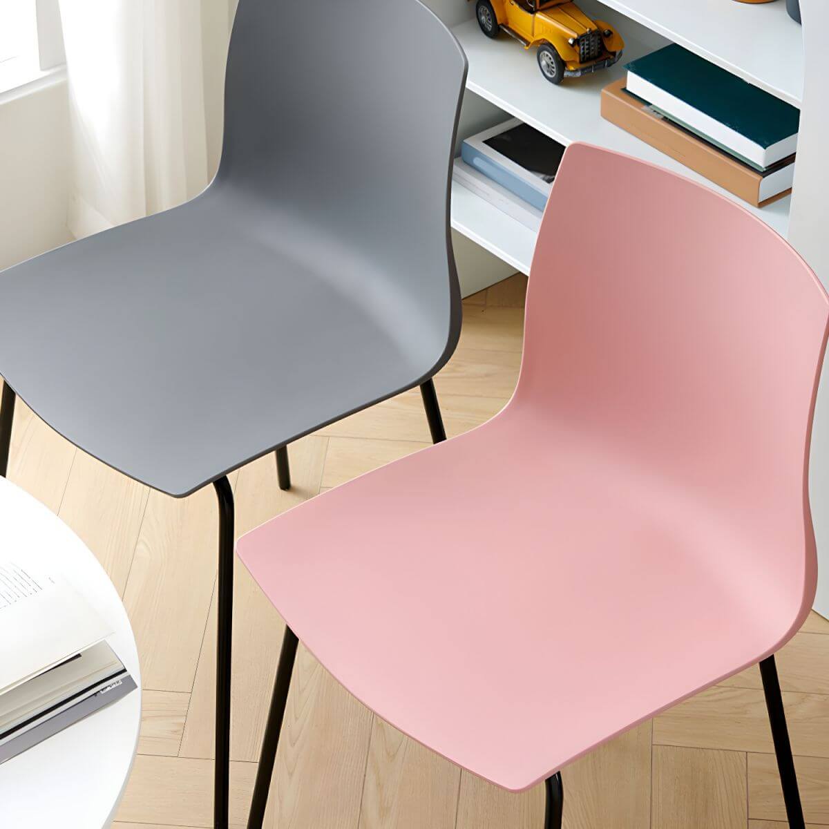 Modern plastic and acrylic side chair with metal legs, ideal for kitchen and dining rooms