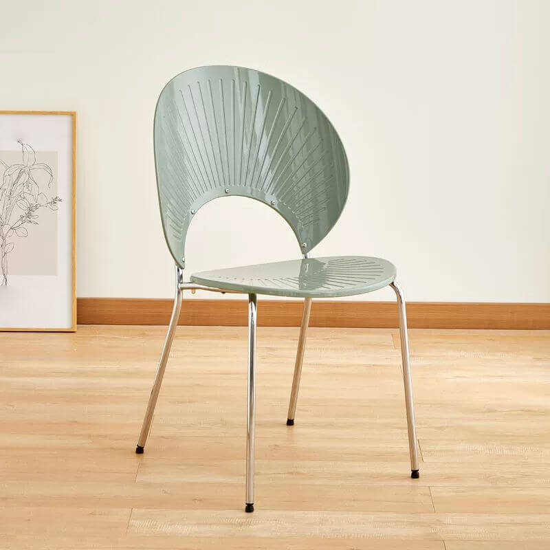 Stackable Scandinavian style dining chair with plastic seat, acrylic back, and silver legs