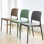 Scandinavian plastic and acrylic dining chair with low backrest and armless design