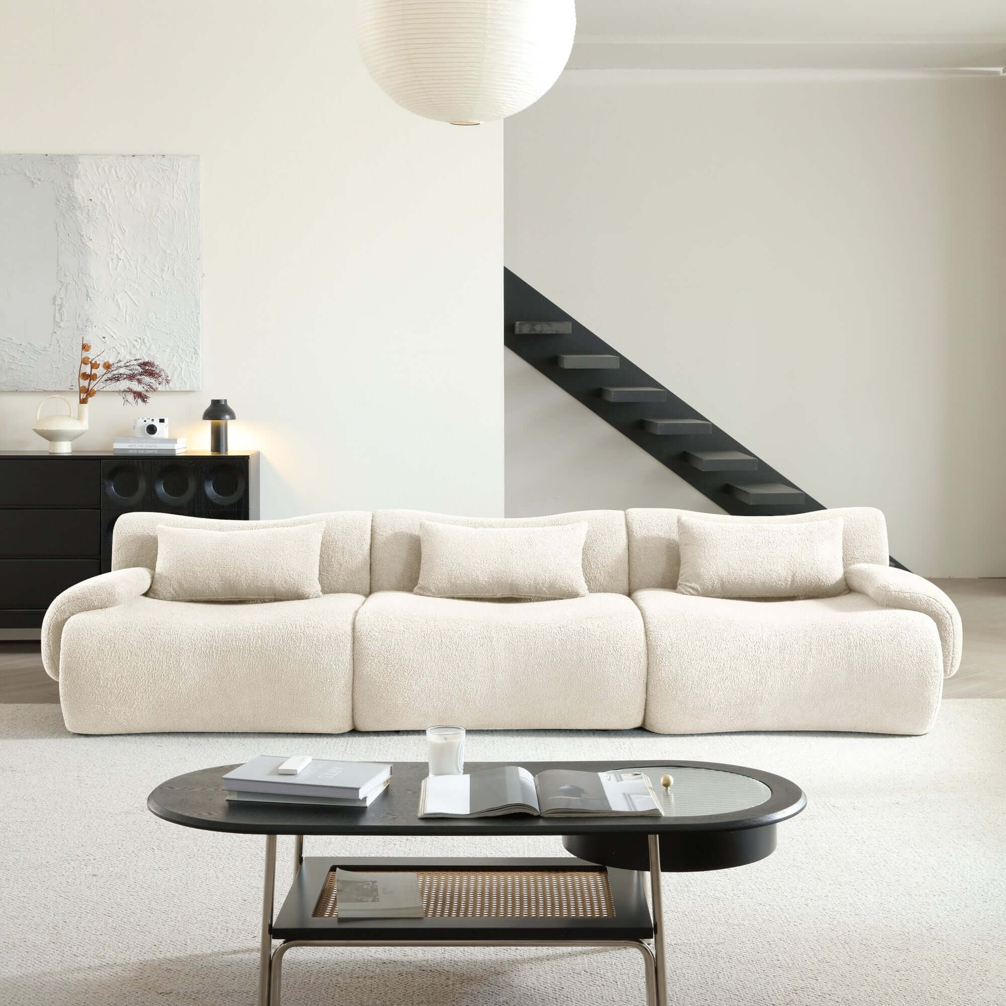 Modern sectional sofa upholstered in soft teddy velvet fabric with modular design