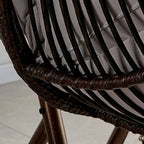 Tropical porch swing with corrosion-resistant cushions, alloy chain, and sturdy stand included