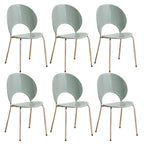 Stackable acrylic dining chair with open back and metal legs, armless design for modern dining rooms