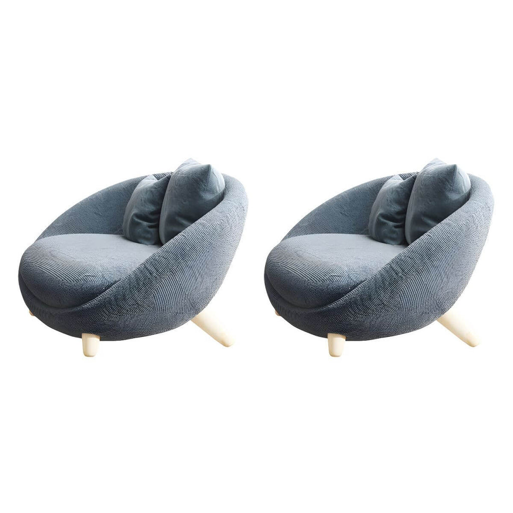 Scandinavian papasan chair with fixed back, sloped arms, cotton blend fabric, and 2 pillows