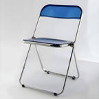 Contemporary acrylic folding armless chair with open back, ideal for dining rooms