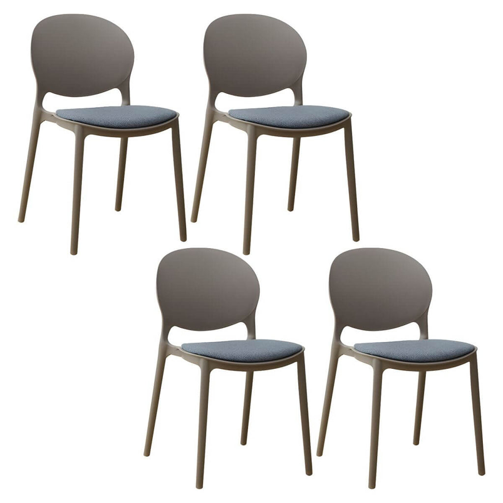 Scandinavian plastic dining chair with open back and four legs, ideal for home use