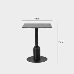 Table ronde en terrazzo polyvalente : Parfaite pour la salle à manger ou le bureau