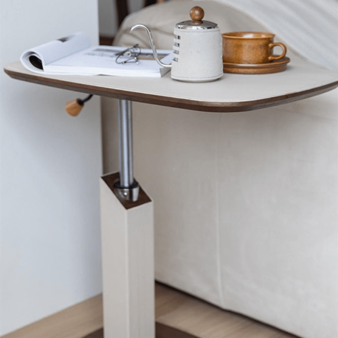 Movable end table in classic beige saddle leather, perfect for cozy living spaces