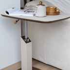 Movable end table in classic beige saddle leather, perfect for cozy living spaces