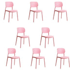 Stackable Scandinavian style plastic and acrylic side chair with low back for dining