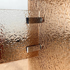 Amber Textured Glass Dining Table with Sculptural Panel Base
