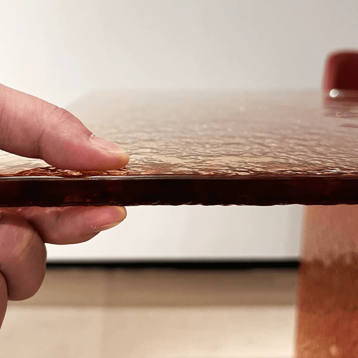 Amber Textured Glass Dining Table with Sculptural Panel Base