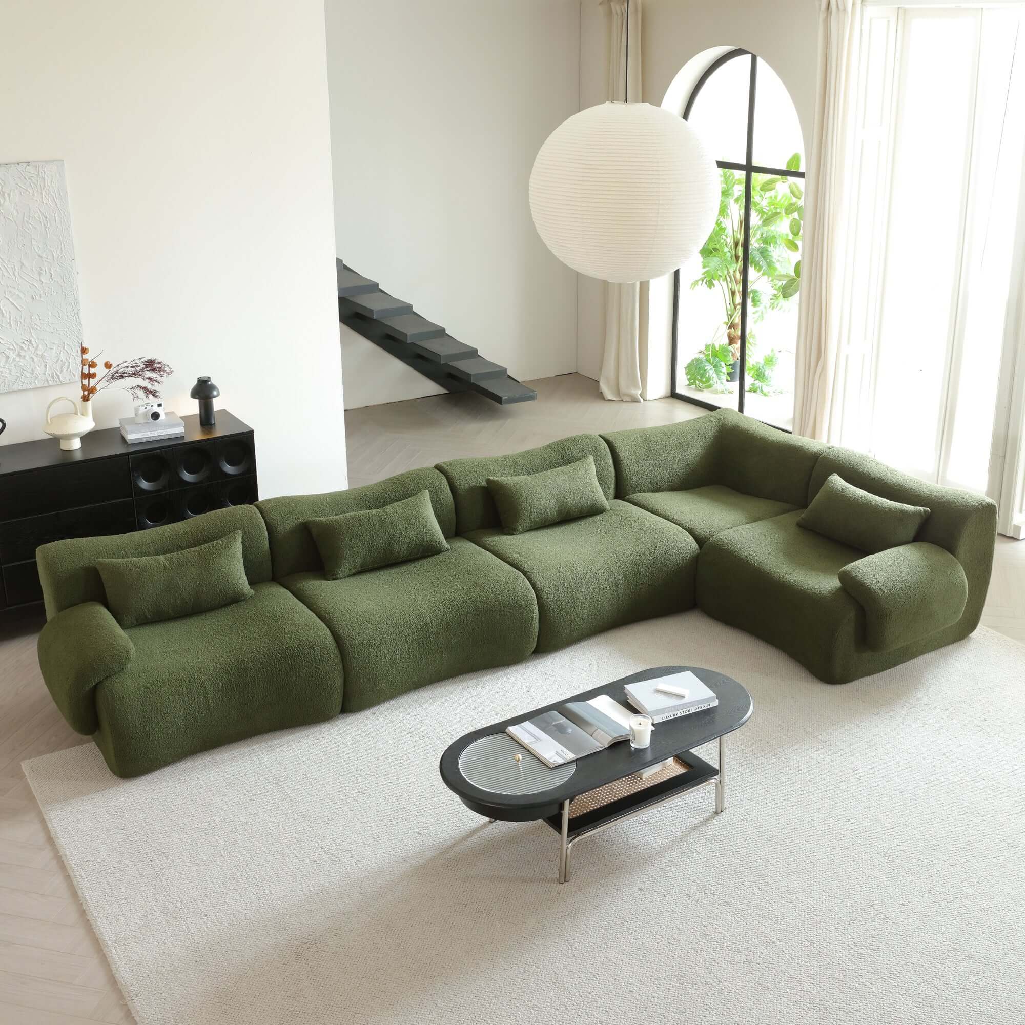 Modern sectional sofa upholstered in soft teddy velvet fabric with modular design