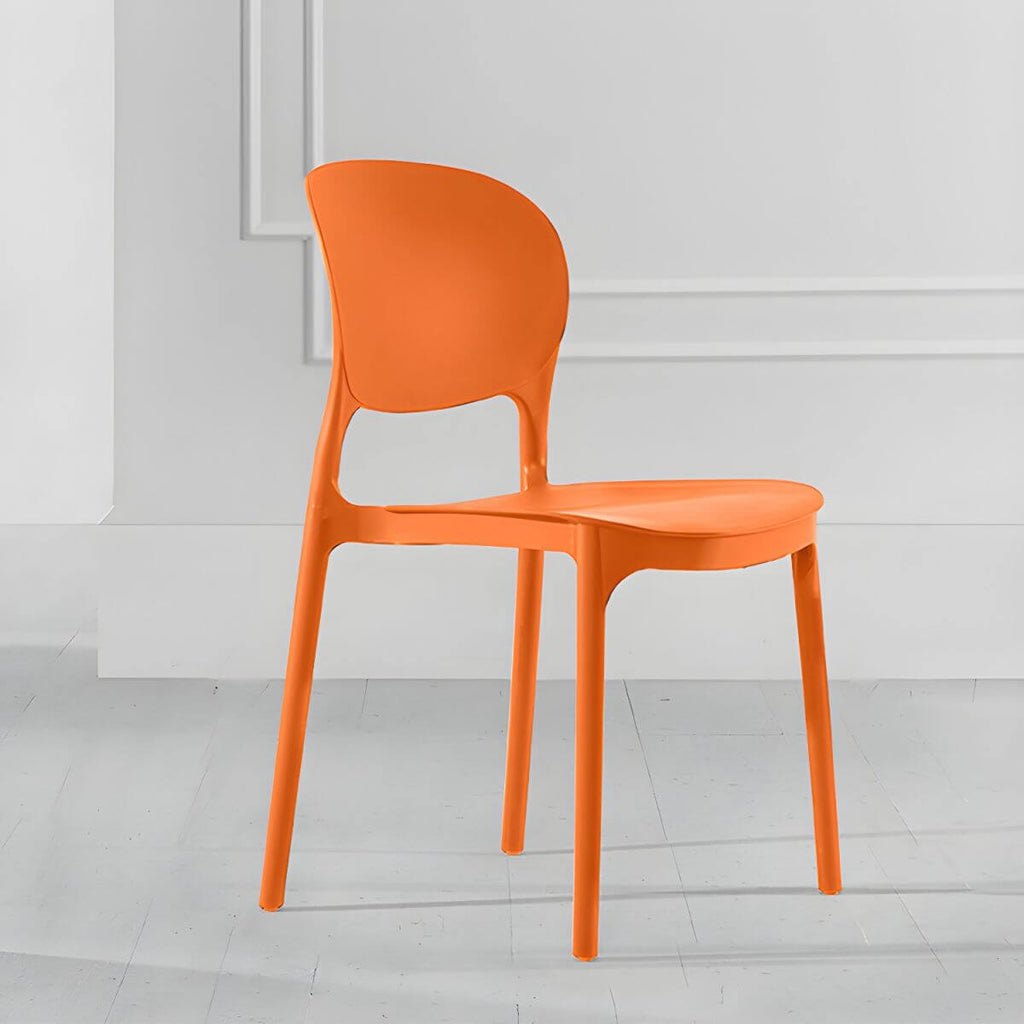 Stackable modern side chair with low back made of plastic and acrylic, perfect for contemporary dining