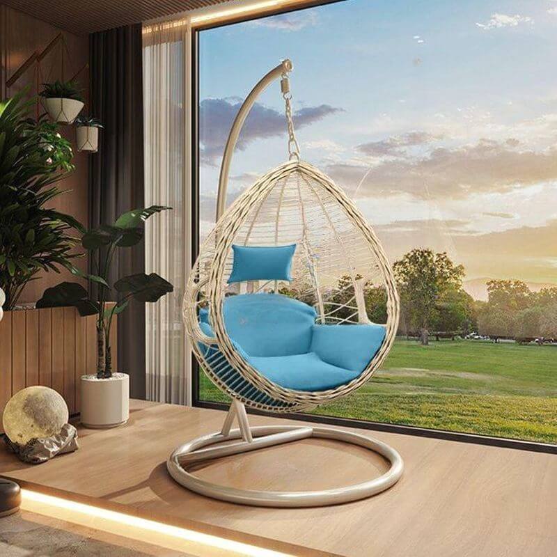 Porch swing with tropical ivory and auburn hydrophobic framed pads, metal stand and chain included