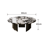 Round terrazzo coffee table set with black and white pattern, perfect for modern living rooms