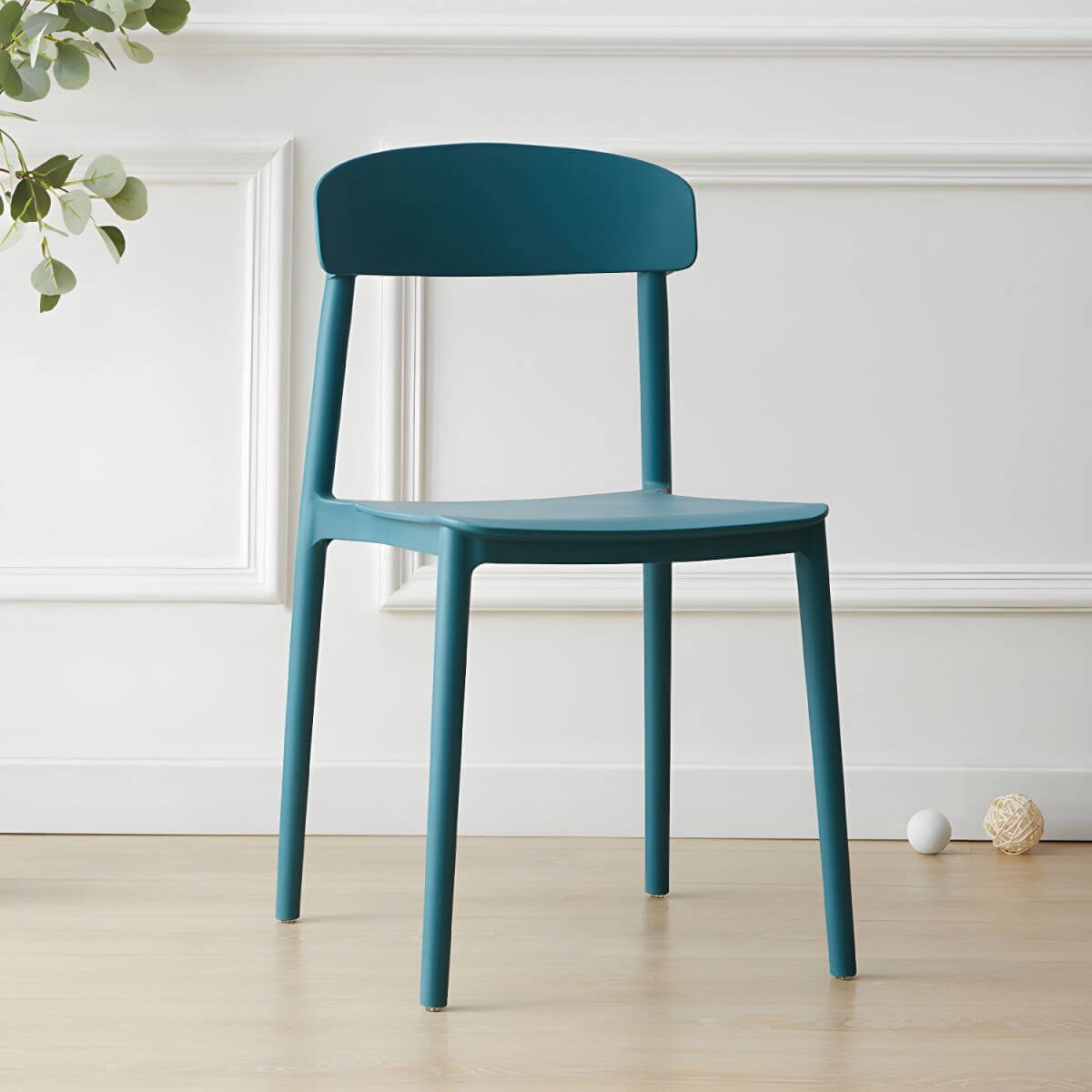 Scandinavian style low back kitchen and dining chair made of plastic and acrylic