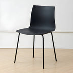 Modern plastic and acrylic side chair with metal legs, ideal for kitchen and dining rooms