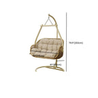 Tropical cocoa and cream upholstered porch swing with alloy frame, stand, and chain included
