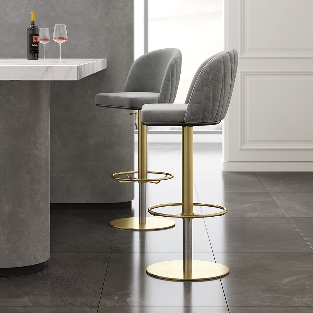 Gray velvet swivel bar stool with curved back and adjustable height, perfect for kitchen or bar seating