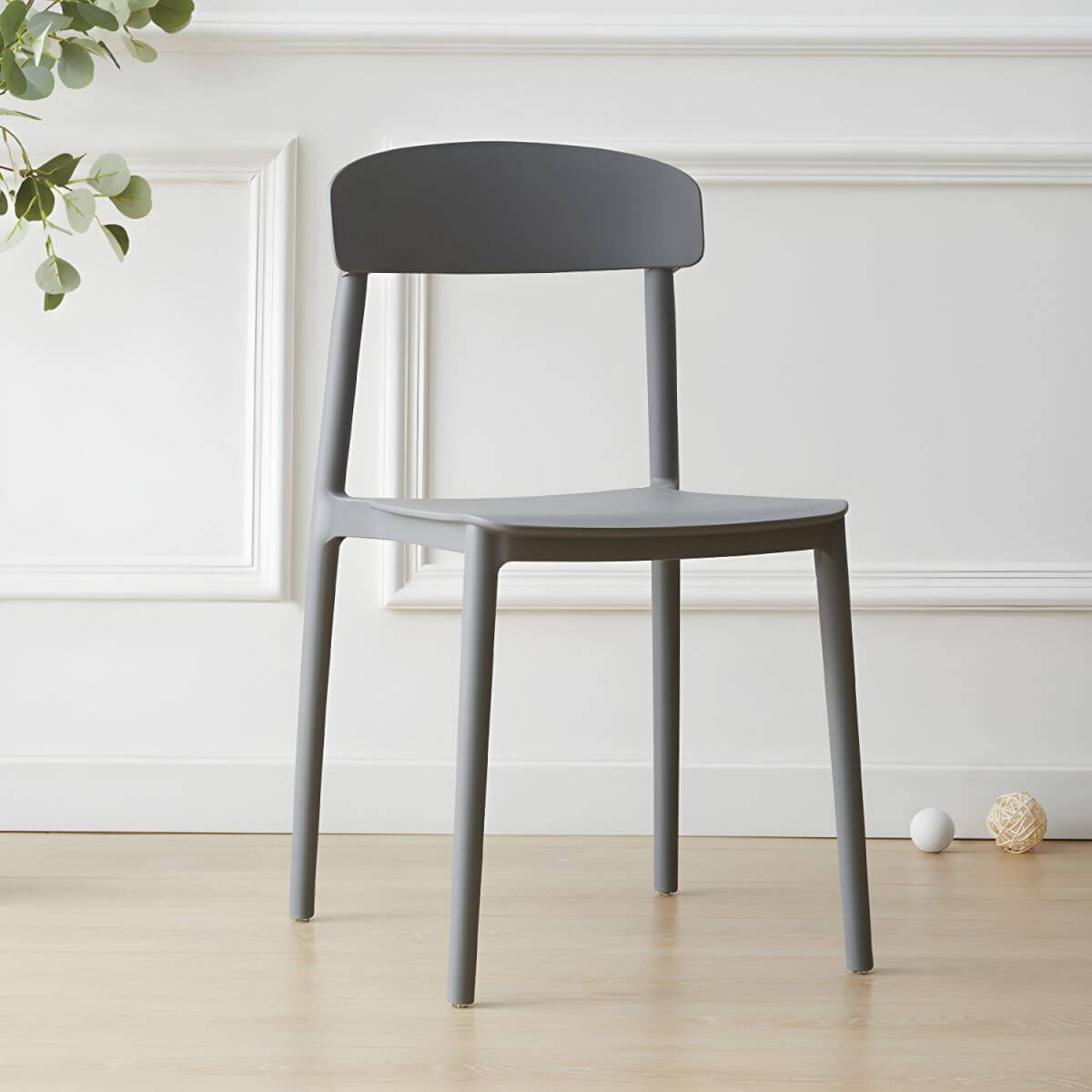 Scandinavian style low back kitchen and dining chair made of plastic and acrylic