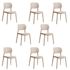 Stackable Scandinavian style plastic and acrylic side chair with low back for dining